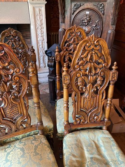 Suite of ten Henri II style chairs in carved...