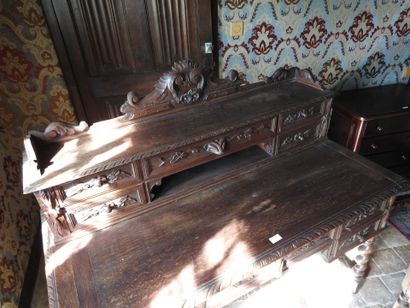 Carved wood stepped desk opening with four...