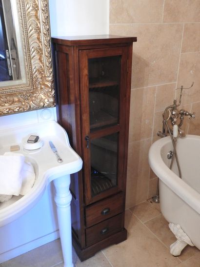 Pair of small wooden storage units opening...