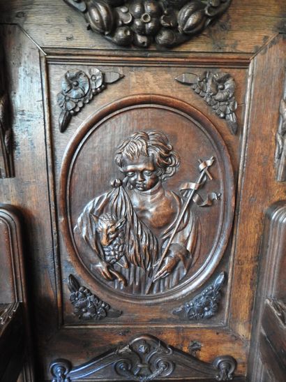 Carved oak cathedra decorated with Saint...