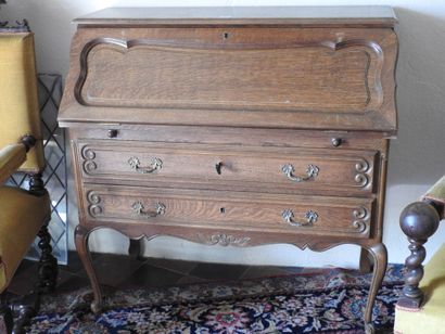 Secretary desk in molded wood opening with...