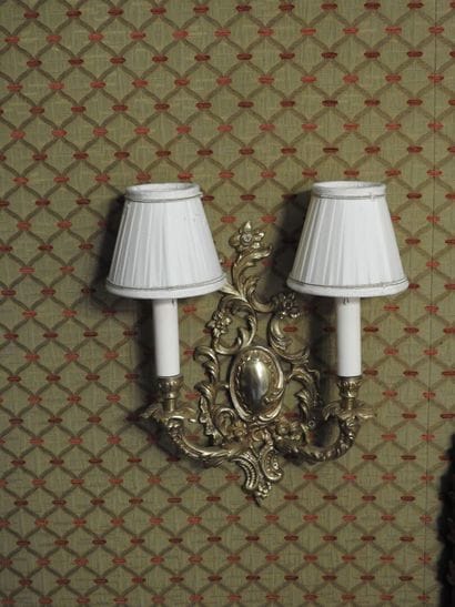Pair of ormolu two-light sconces. 
Rocaille...