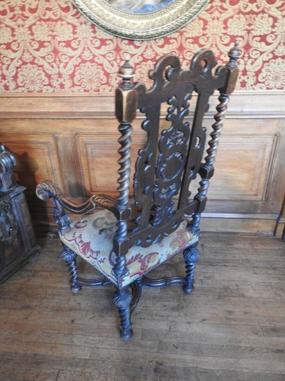 Carved wood armchairs, crook-shaped arms,...