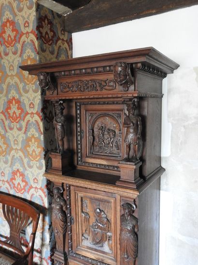 Carved wood cabinet with two doors and a...