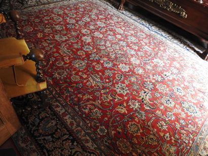 Polychrome wool hand-knotted rug decorated...