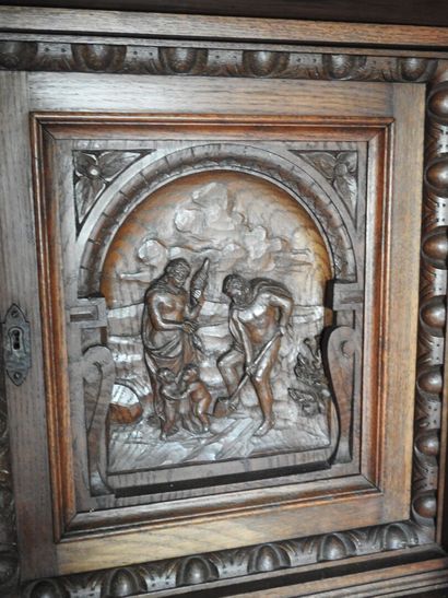 Carved wood cabinet with two doors and a...