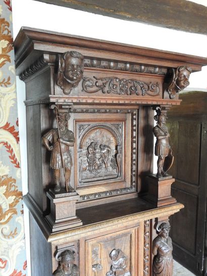 Carved wood cabinet with two doors and a...