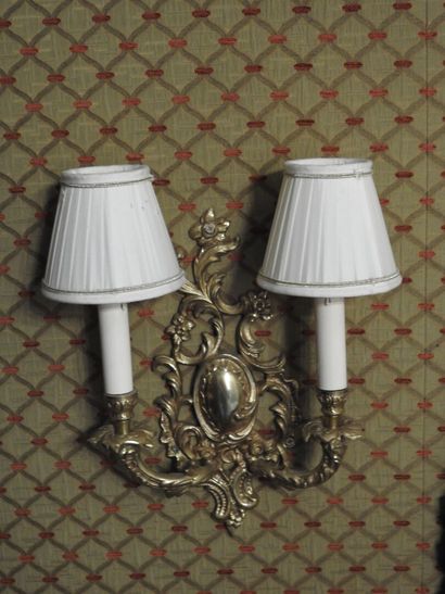Pair of ormolu two-light sconces. 
Rocaille...