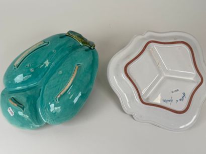 Two polychrome earthenware beggars, one decorated...