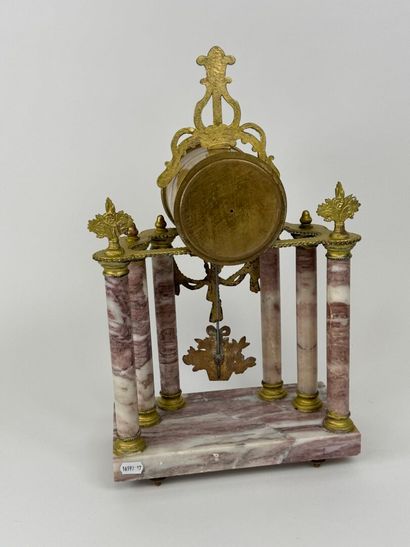 Column clock in veined marble and gilded...