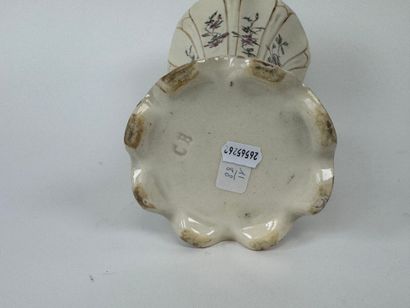 LANGEAIS, 20th century.
Cream earthenware...