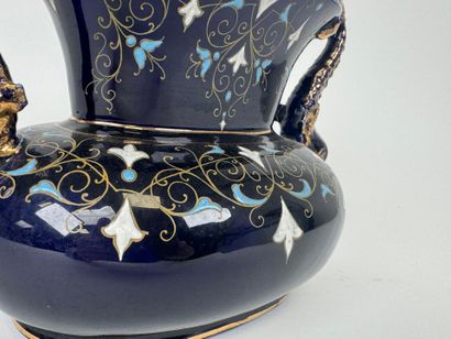 LUNEVILLE.
Earthenware planter on a blue...