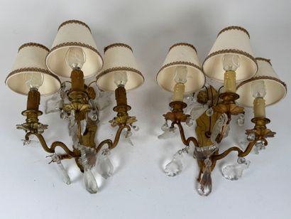 Pair of ormolu sconces with three light arms...