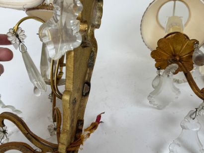 Pair of ormolu sconces with three light arms...