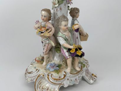 A polychrome and gold porcelain bowl decorated...