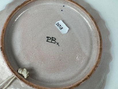 Polychrome and gold earthenware lot including:
-...