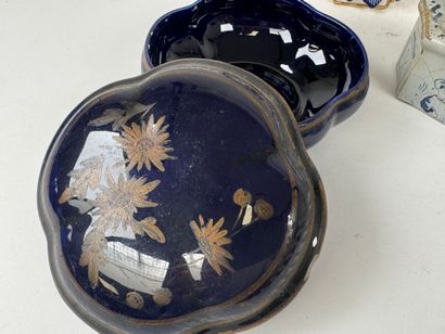Polychrome and gold earthenware lot including:
-...