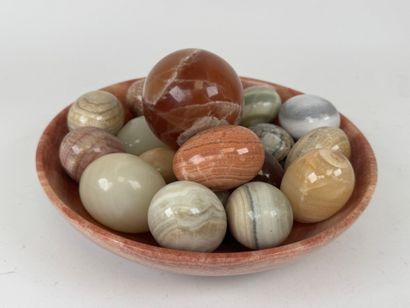 Collection of eggs in hard stone.
Approximately...
