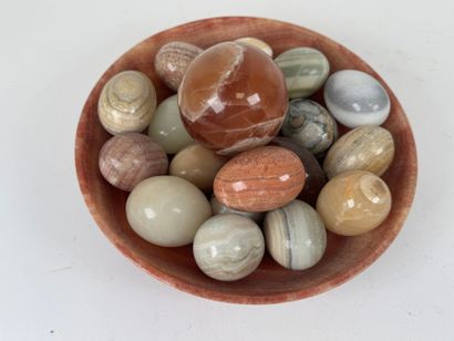 Collection of eggs in hard stone.
Approximately...