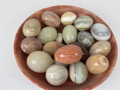 Collection of eggs in hard stone.
Approximately...