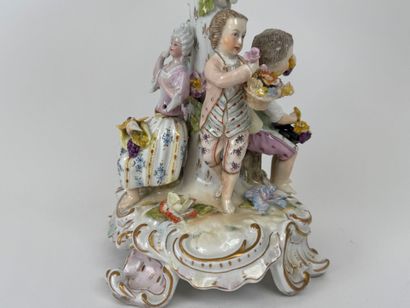 A polychrome and gold porcelain bowl decorated...