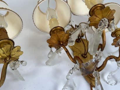 Pair of ormolu sconces with three light arms...