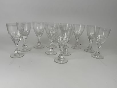 Set of 11 cut-crystal water glasses.
H. 17...