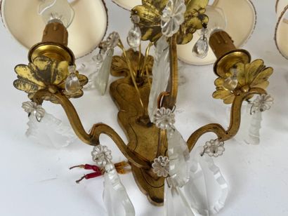 Pair of ormolu sconces with three light arms...