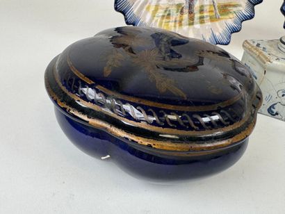 Polychrome and gold earthenware lot including:
-...
