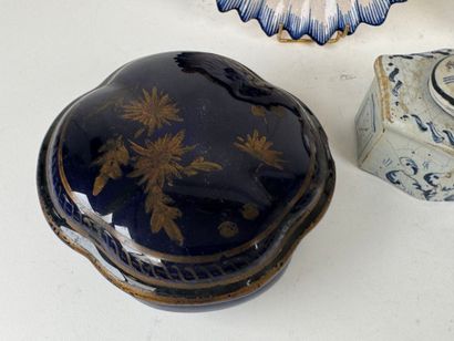 Polychrome and gold earthenware lot including:
-...