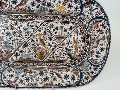Large polychrome earthenware dish with enameled...