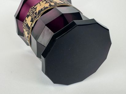 Colored glass vase with cut sides, decorated...