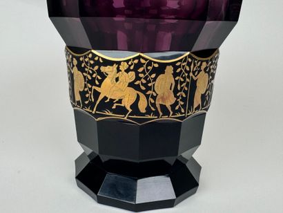 Colored glass vase with cut sides, decorated...