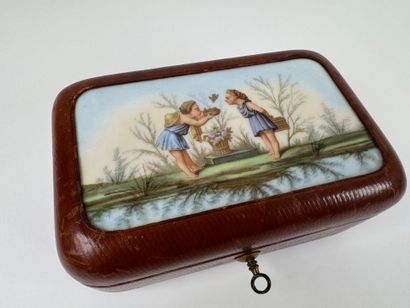 Leather-wrapped rectangular case, the lid...