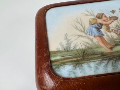Leather-wrapped rectangular case, the lid...