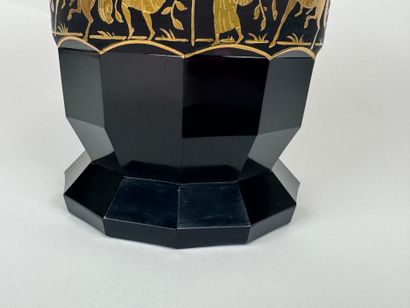 Colored glass vase with cut sides, decorated...