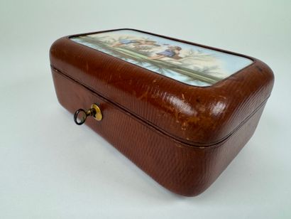Leather-wrapped rectangular case, the lid...