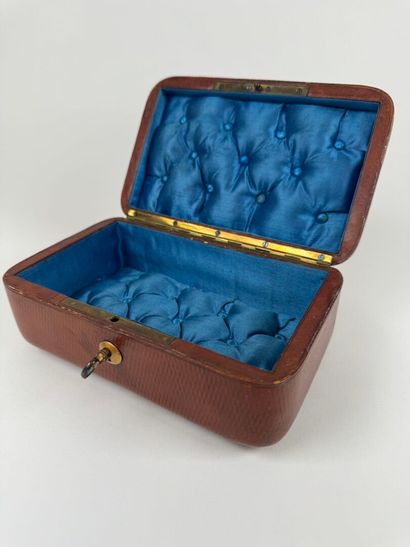 Leather-wrapped rectangular case, the lid...