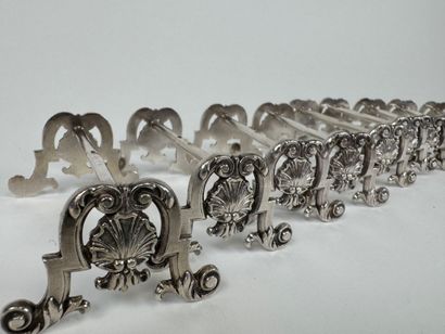 Suite of 12 silver-plated knife holders decorated...