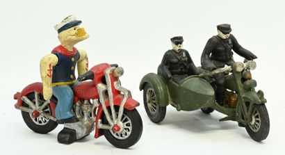 Two cast-iron motorcycles, to be dusted,...