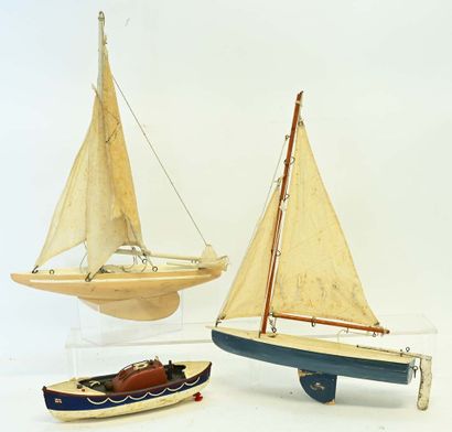 Lot of 3 boats as is:
 - White wooden sailboat...