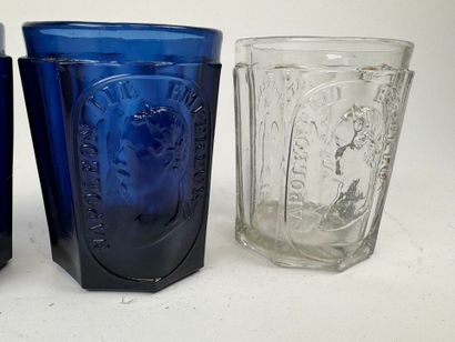 Three glasses, two of which are colored with...