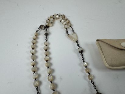 Mother-of-pearl and metal rosary, presented...