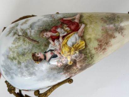 A large polychrome and gold porcelain vase...