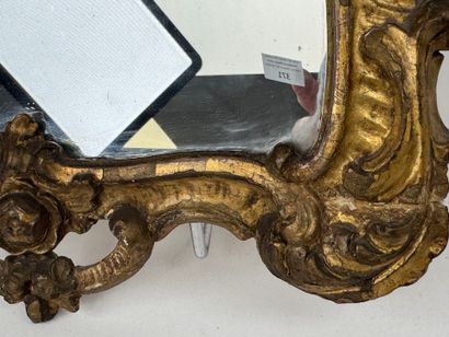 Small mirror in wood and gilded stucco, with...