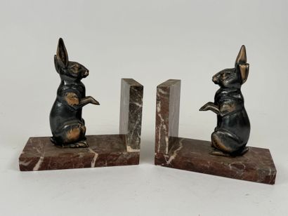 Pair of bookends in patinated regula with...