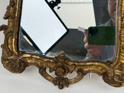 Small mirror in wood and gilded stucco, with...