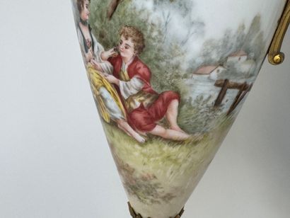 A large polychrome and gold porcelain vase...