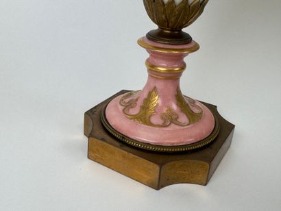 A large polychrome and gold porcelain vase...