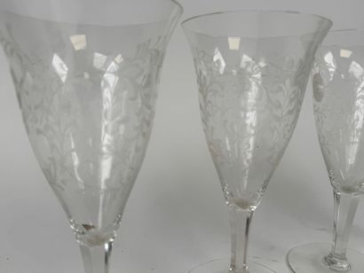 Four engraved glass tasting glasses with...
